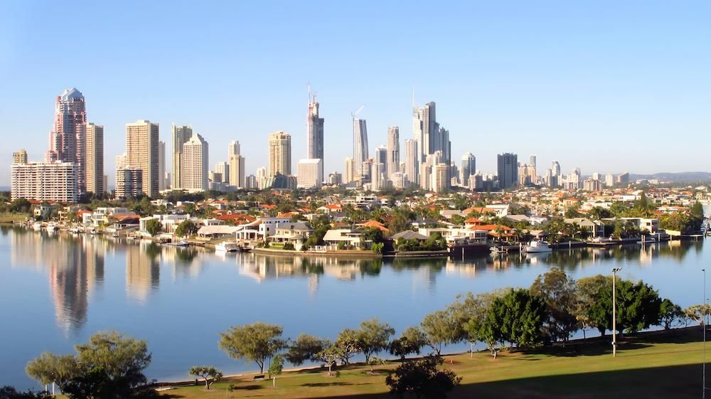 City Skyline Across a Waterway With Buildings — Lite Moves Furniture Removals In Bonville, NSW