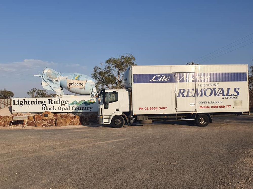 Carton Boxes With Stuff In Empty Room — Lite Moves Furniture Removals In Bonville, NSW