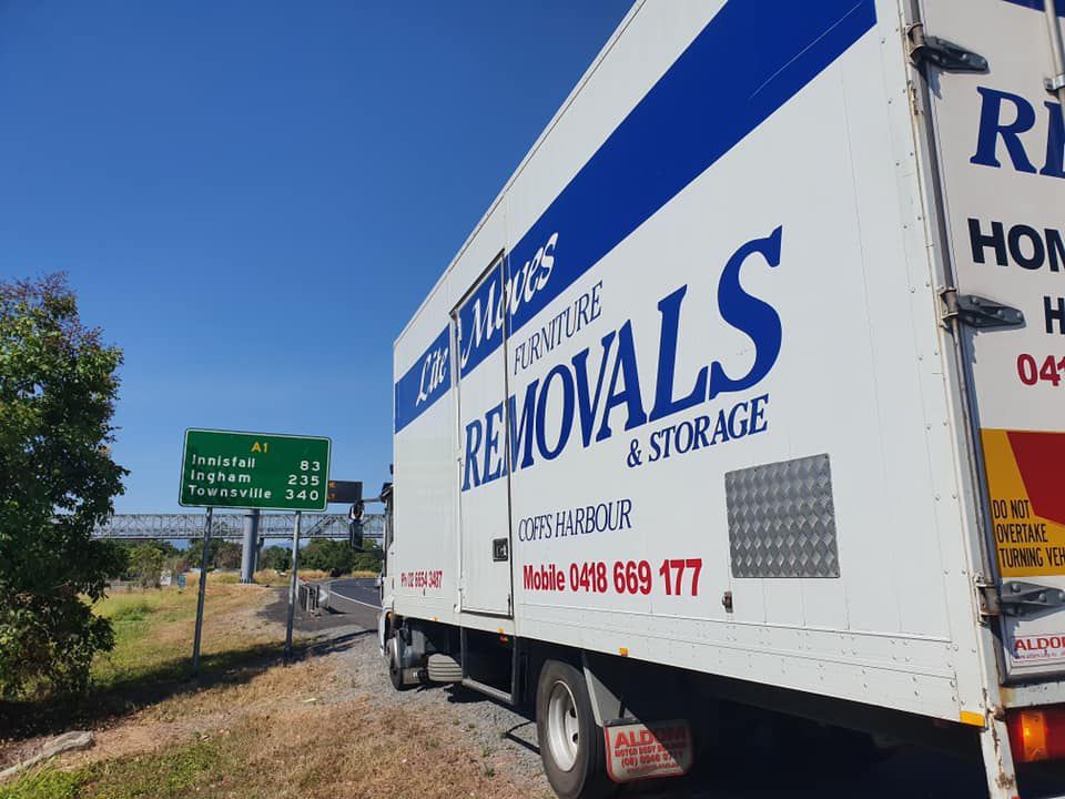 Lite Moves Truck Parked On The Side Of The Road — Lite Moves Furniture Removals In Bonville, NSW