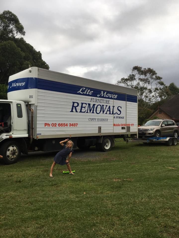 Little Girl With The Furniture Removals Truck Background — Lite Moves Furniture Removals In Bonville,NSW