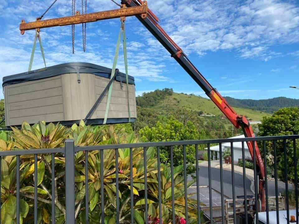 Crane lifting pool - Lite Moves Furniture Removals In Bonville, NSW