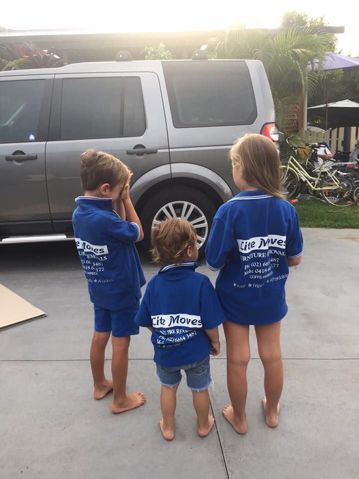 Three Kids Wearing Lite Moves Furniture Removal Uniform — Lite Moves Furniture Removals In Bonville, NSW