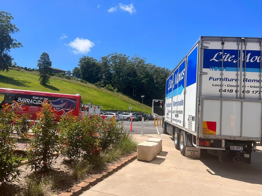 White Truck Mover At The Parking Area — Lite Moves Furniture Removals In Bonville, NSW