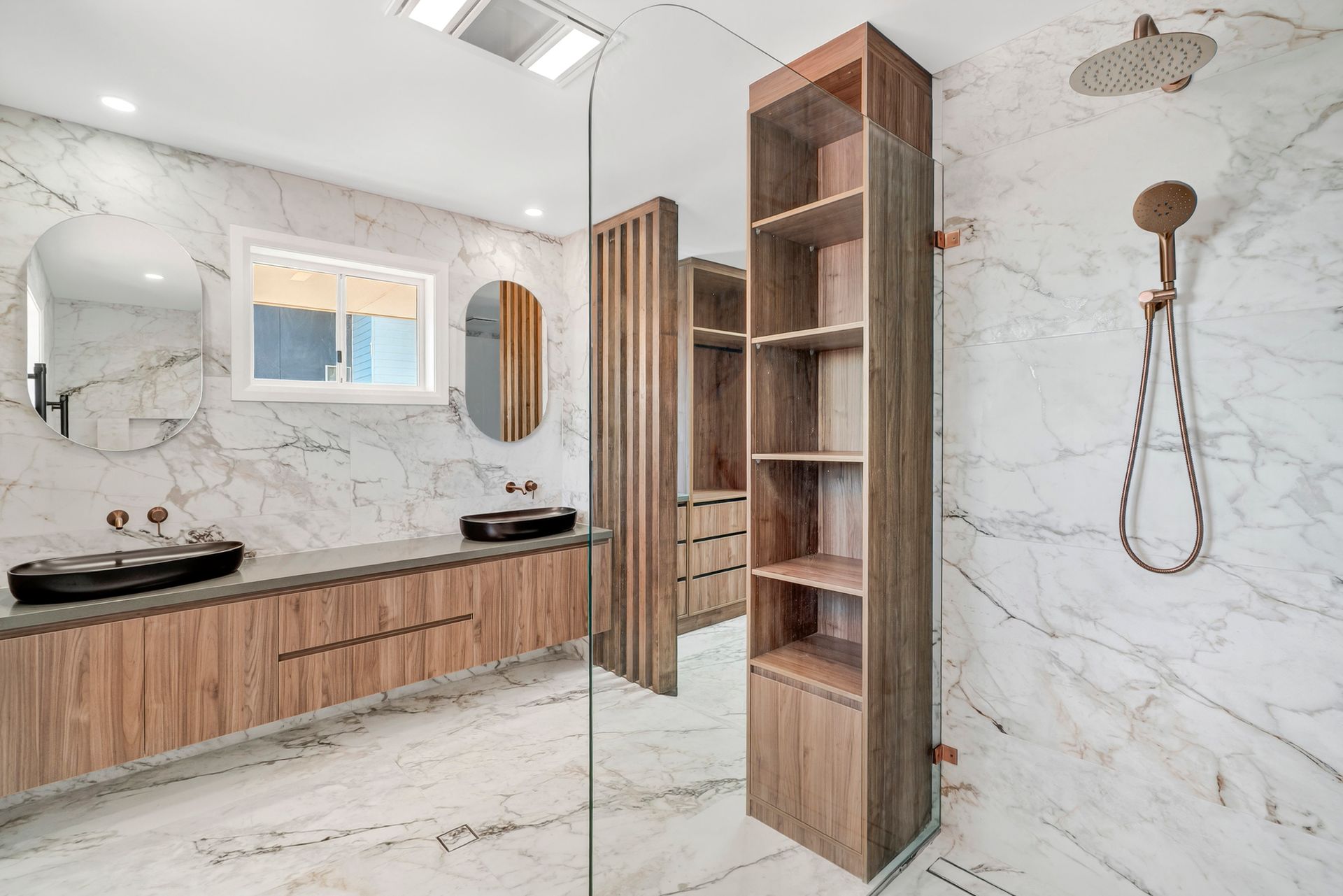Modern bathroom with marble walls, wooden vanity, and open shelving— PK4 Projects in Port Macquarie, NSW