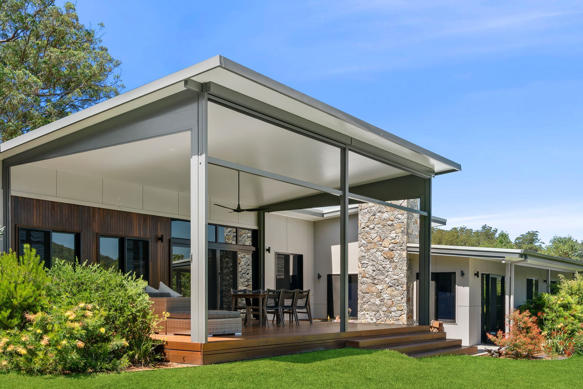 A covered verandah area with lawn in front of it — PK4 Projects in Port Macquarie, NSW 