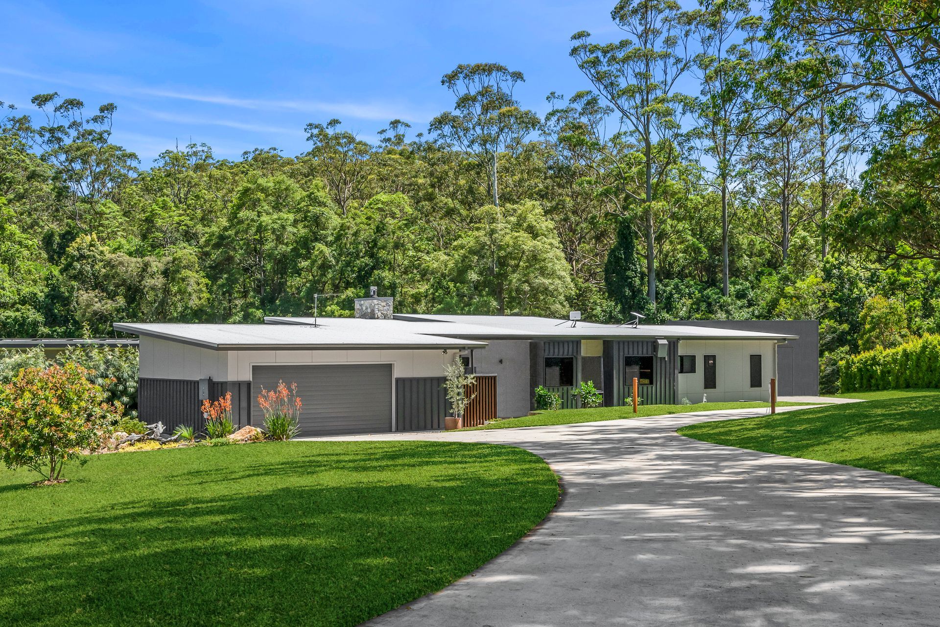 Outdoor view of a house with a long driveway — PK4 Projects in Port Macquarie, NSW