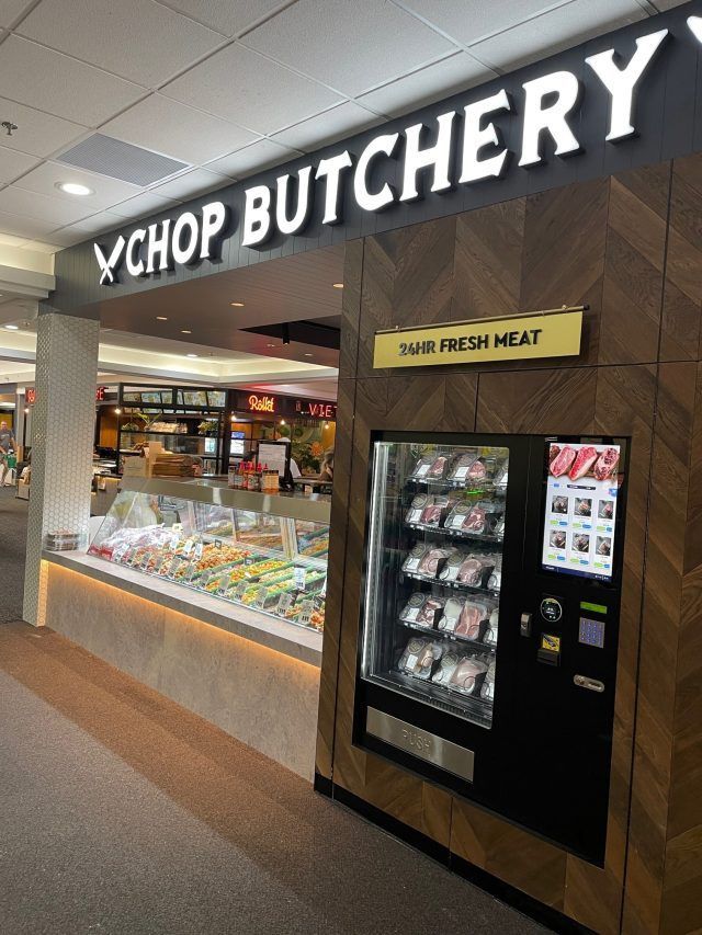 Chop Butchery storefront with lighted sign, a fresh meat vending machine, and display case of produce — PK4 Projects in Port Macquarie, NSW