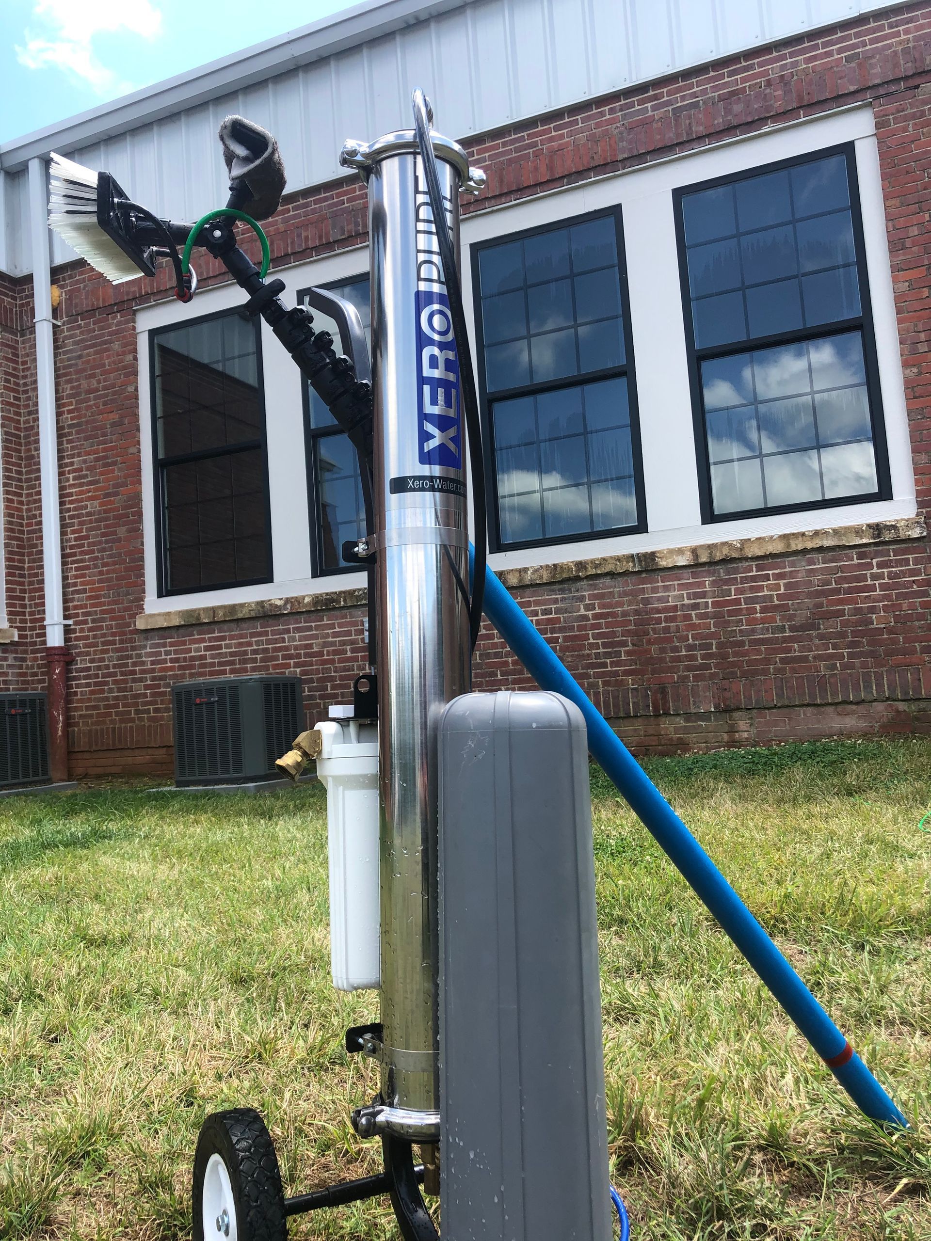 A stainless steel water filtration system, labeled