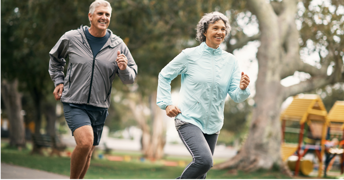 An active senior couple jogging outdoors, reflecting the renewed vitality and natural healing benefi