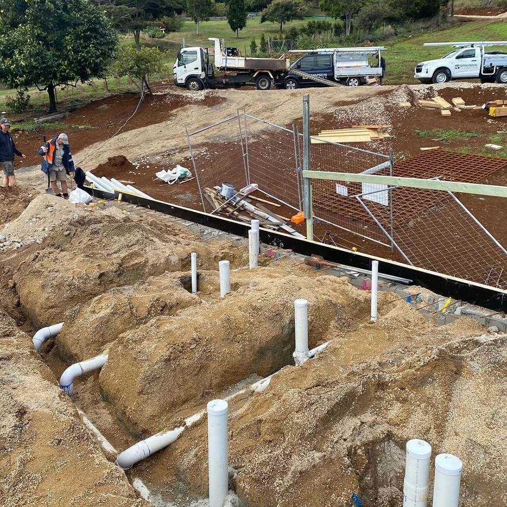 Construction Site With Excavated Trenches and PVC Pipes — Sampson Plumbing Pty Ltd In Coolangatta, QLD