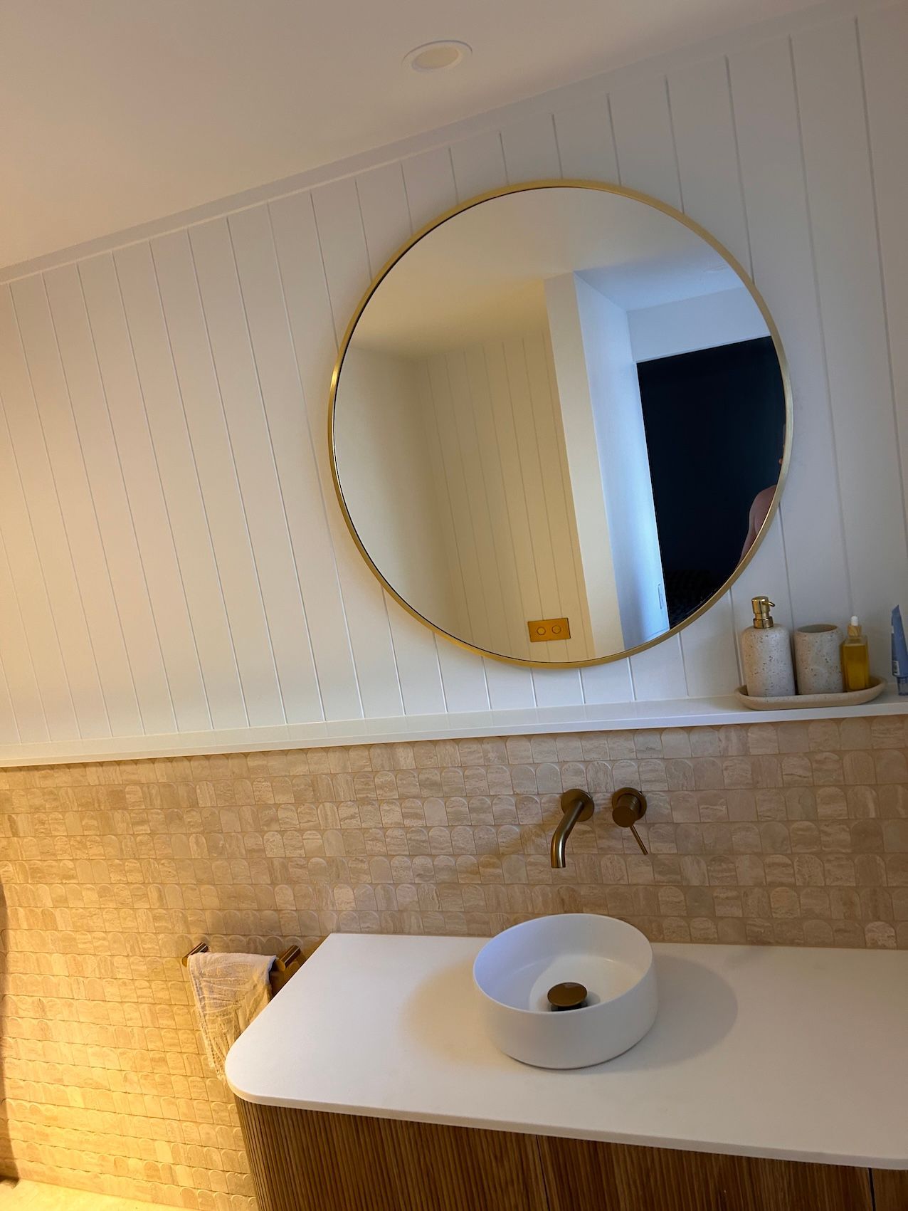 A Round Mirror In A Renovated Bathroom — Sampson Plumbing Pty Ltd In Casuarina, NSW