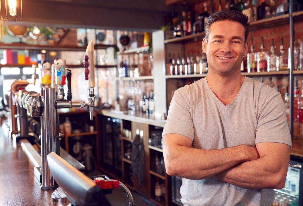 A Man Standing in Front of the Bar — Commercial Equipment in Port Macquarie, NSW