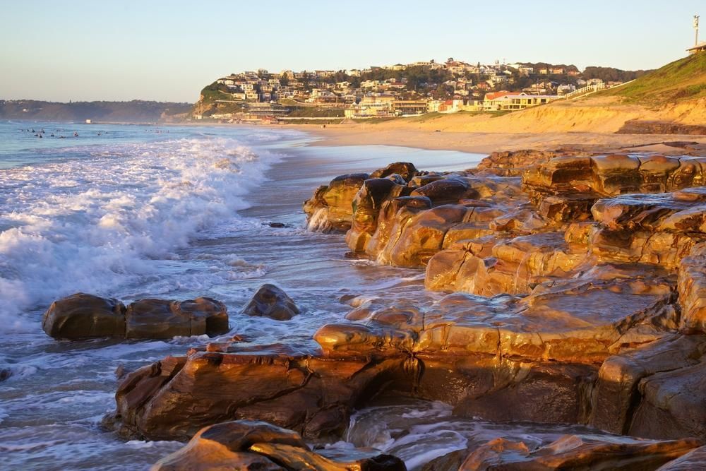A Beach with a Lot of Rocks and Waves  — Bakery Equipment in Newcastle, NSW