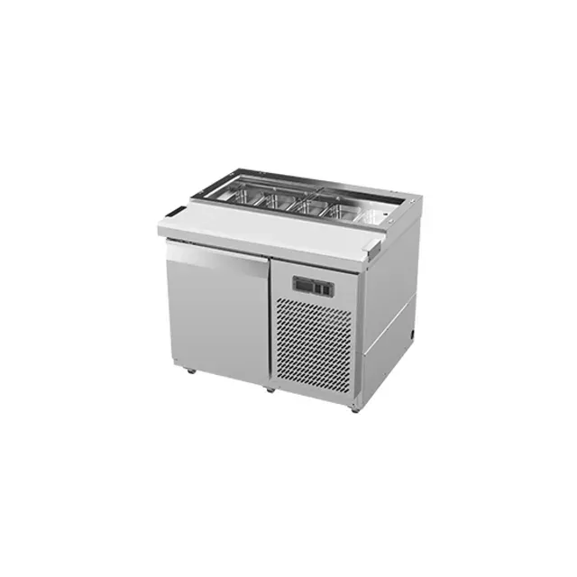 A stainless steel salad bar with a refrigerator underneath it on a white background.