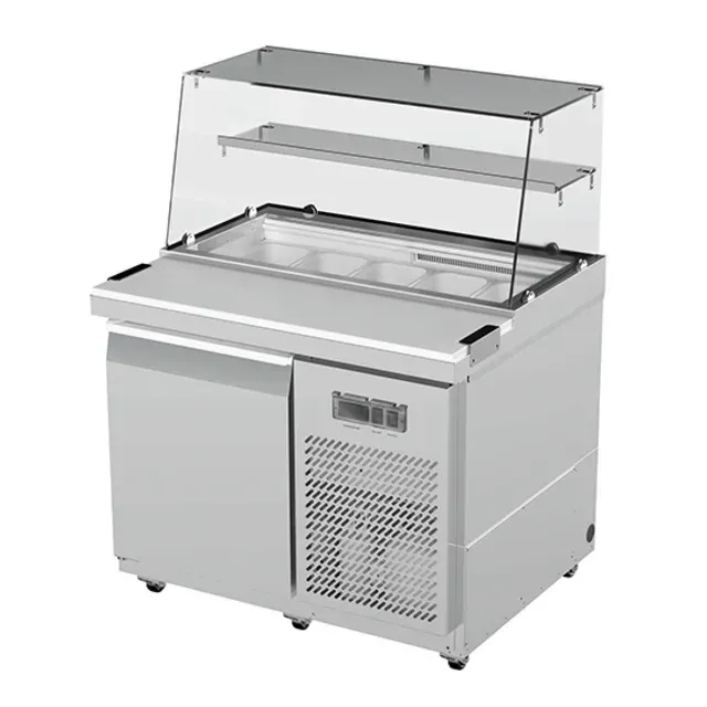 A stainless steel salad bar with a refrigerator underneath it on a white background.