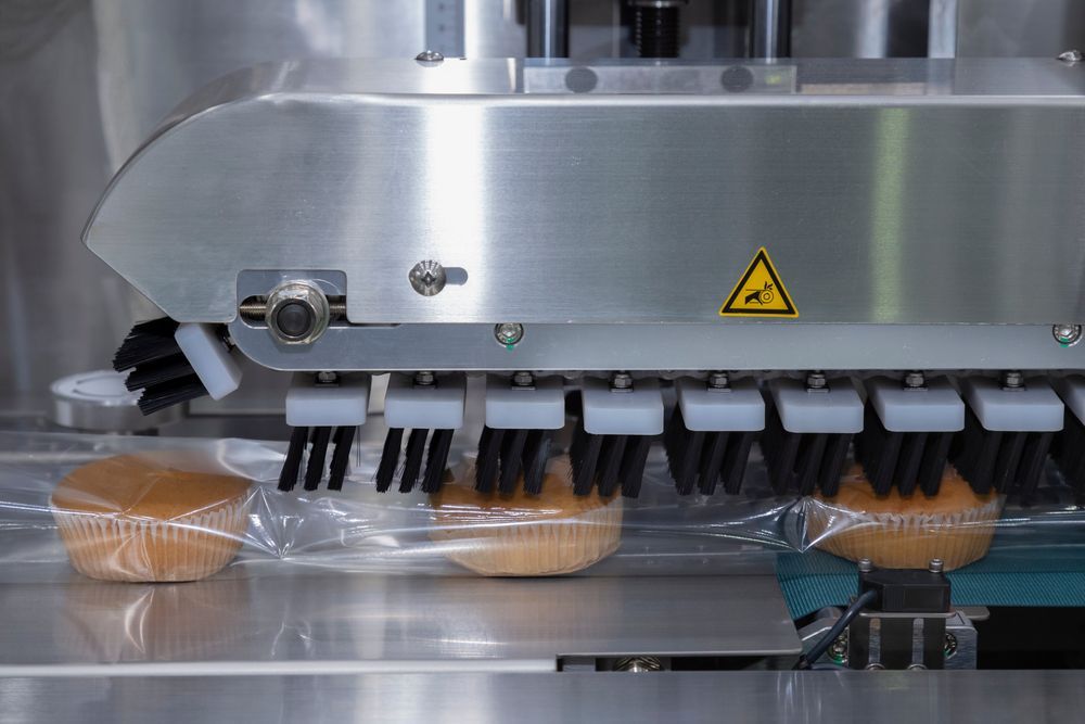 Baked Bread In Plastic Bag On Conveyor - Packaging Equipment in Port Macquarie, NSW