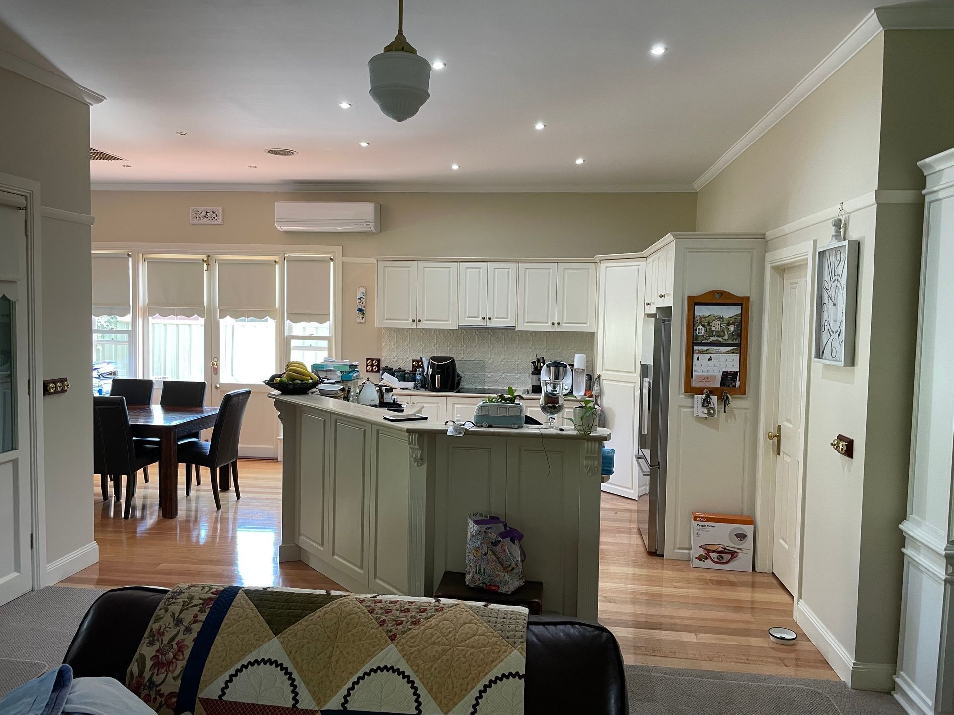A raised T-bar on the angled cabinetry in a Shepparton kitchen before a kitchen renovation by KitchenWise modernised the layout.