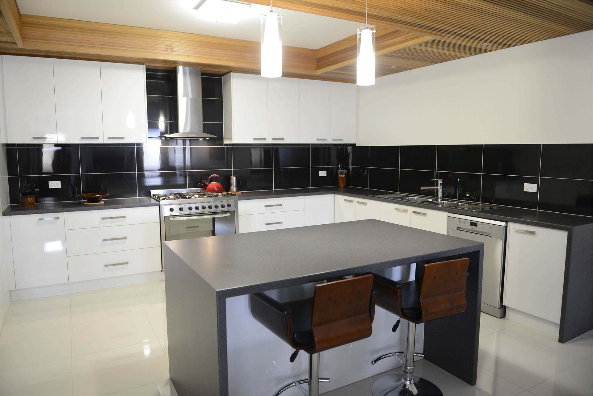 Sleek Stainless Steel Appliances and Marble Countertops in a Contemporary Kitchen — Shepparton Vic — Kitchenwise