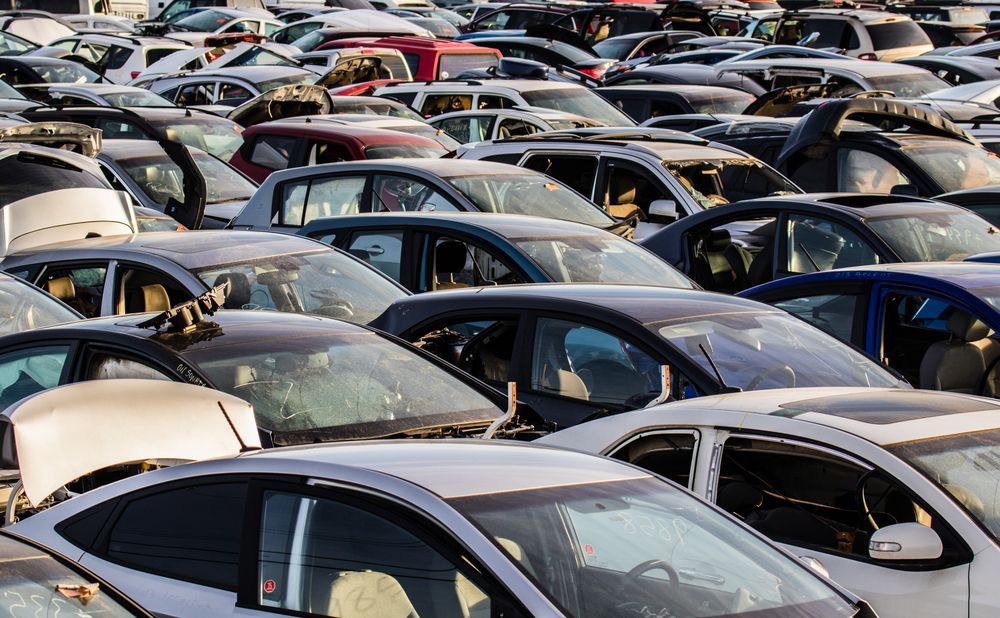 A Lot Of Cars Are Parked In A Parking Lot — Bakers Creek Wreckers In Bakers Creek, QLD