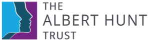 a logo for the albert hunt trust with two faces