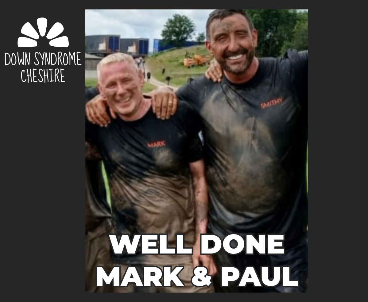 Two friends covered in mud having completed a Tough Mudder in support of Down Syndrome Cheshire