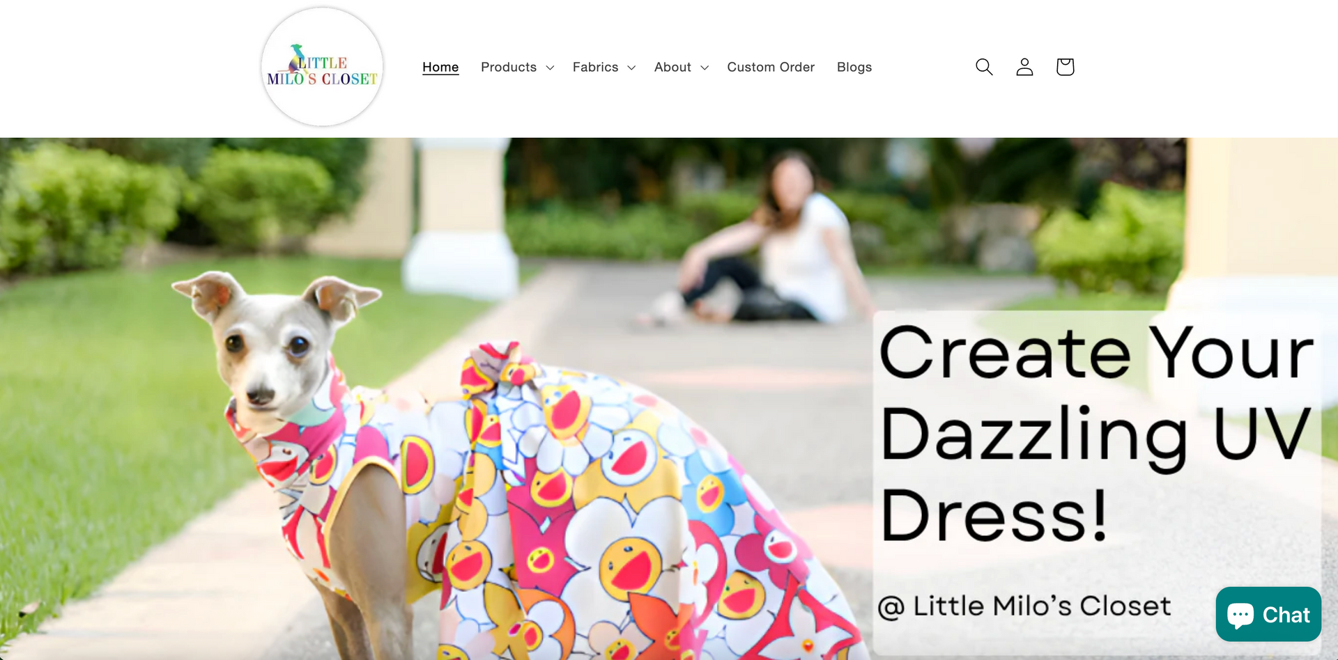 Dog wearing a floral UV dress; website homepage with a woman in background.