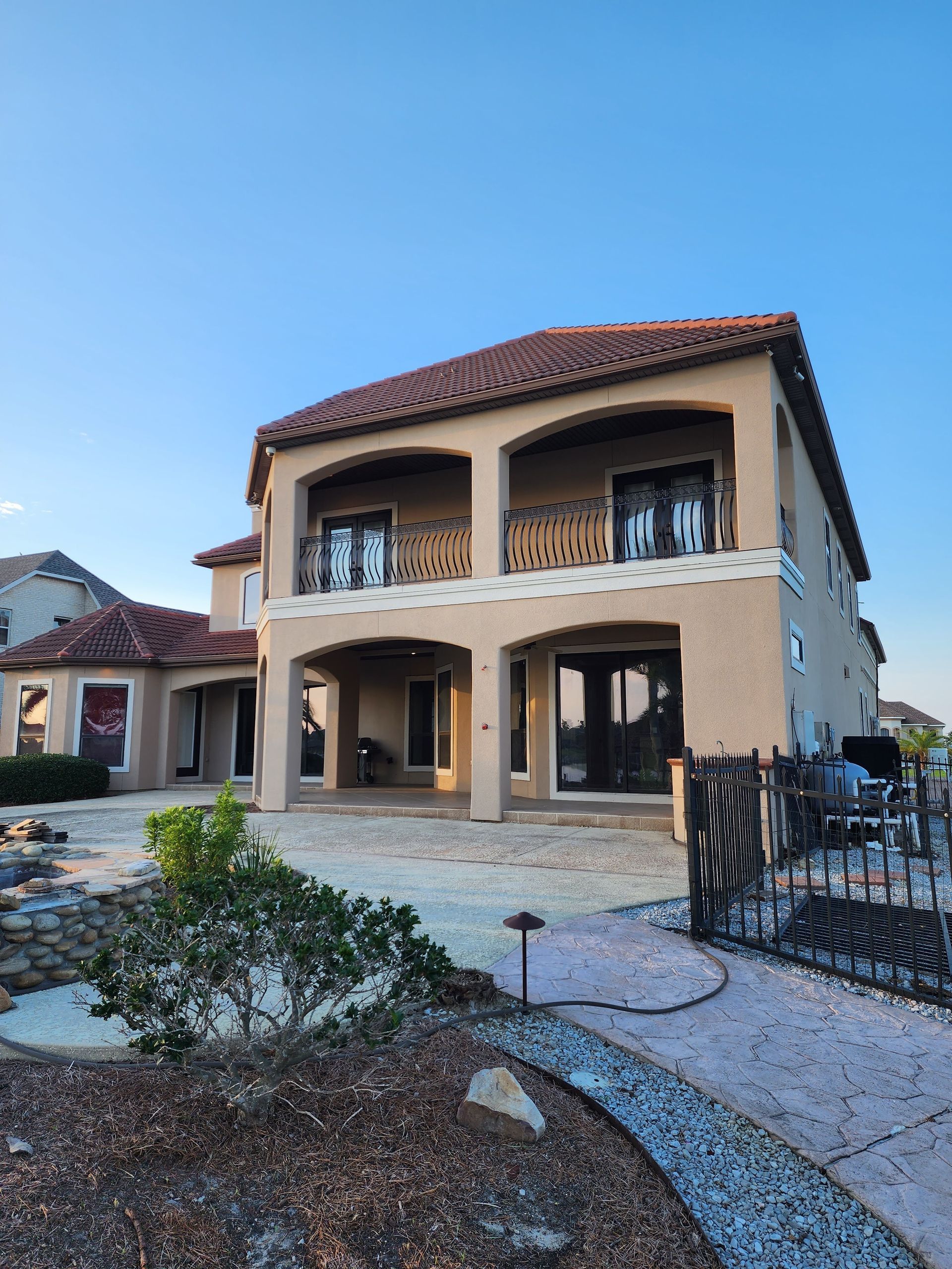 A large house with a lot of windows and balconies