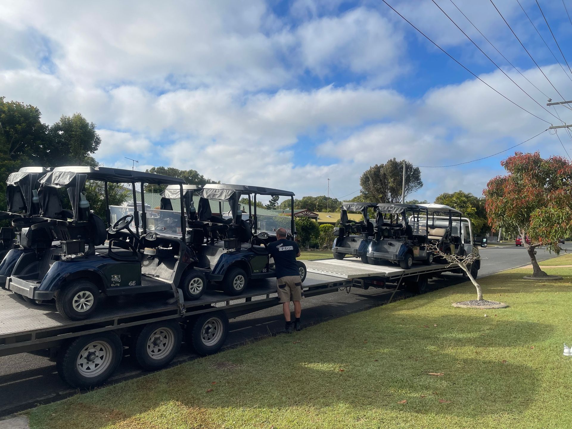 Multiple Golf Carts on a Large Trailer — Buggies & Batteries in Hidden Valley, QLD