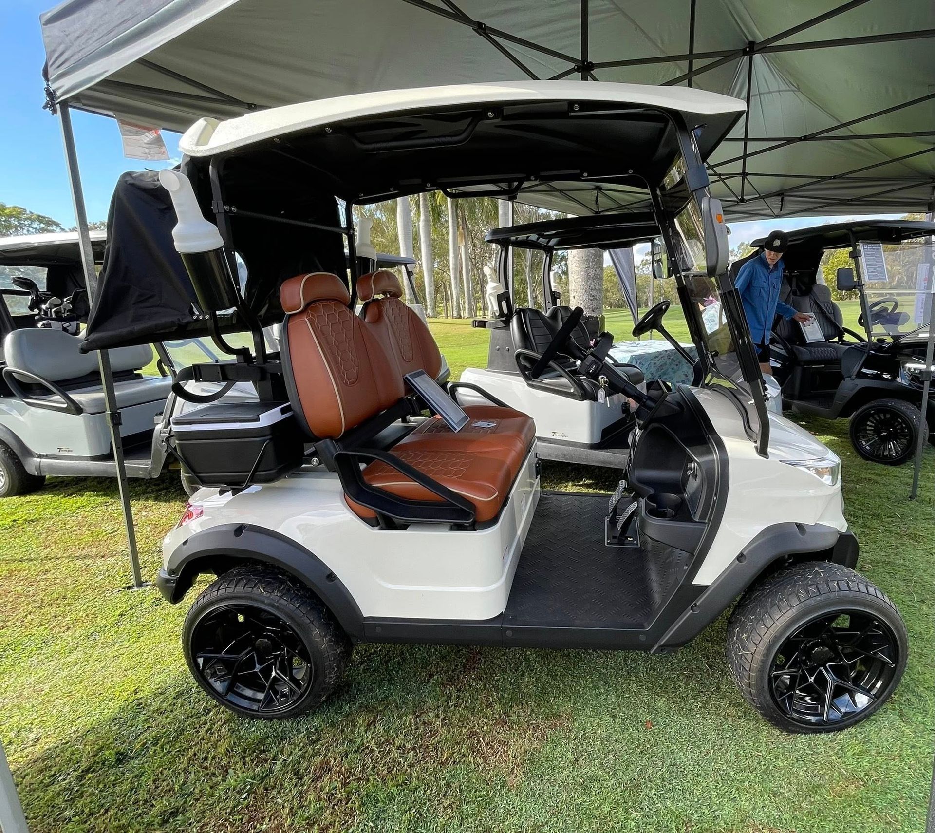 White Golf Cart With Brown Seats — Buggies & Batteries in Hidden Valley, QLD