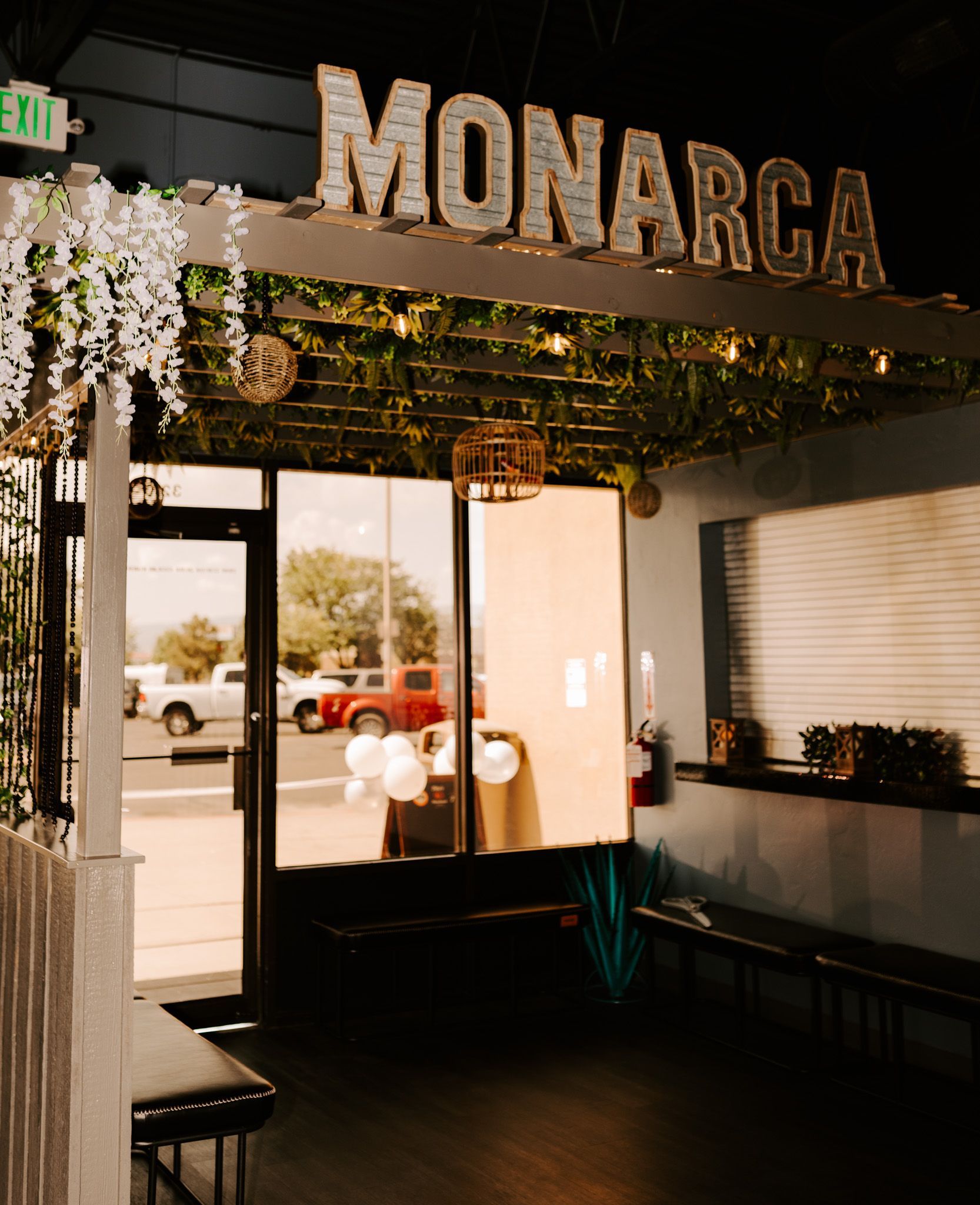 A restaurant with a sign that says monarcha on it