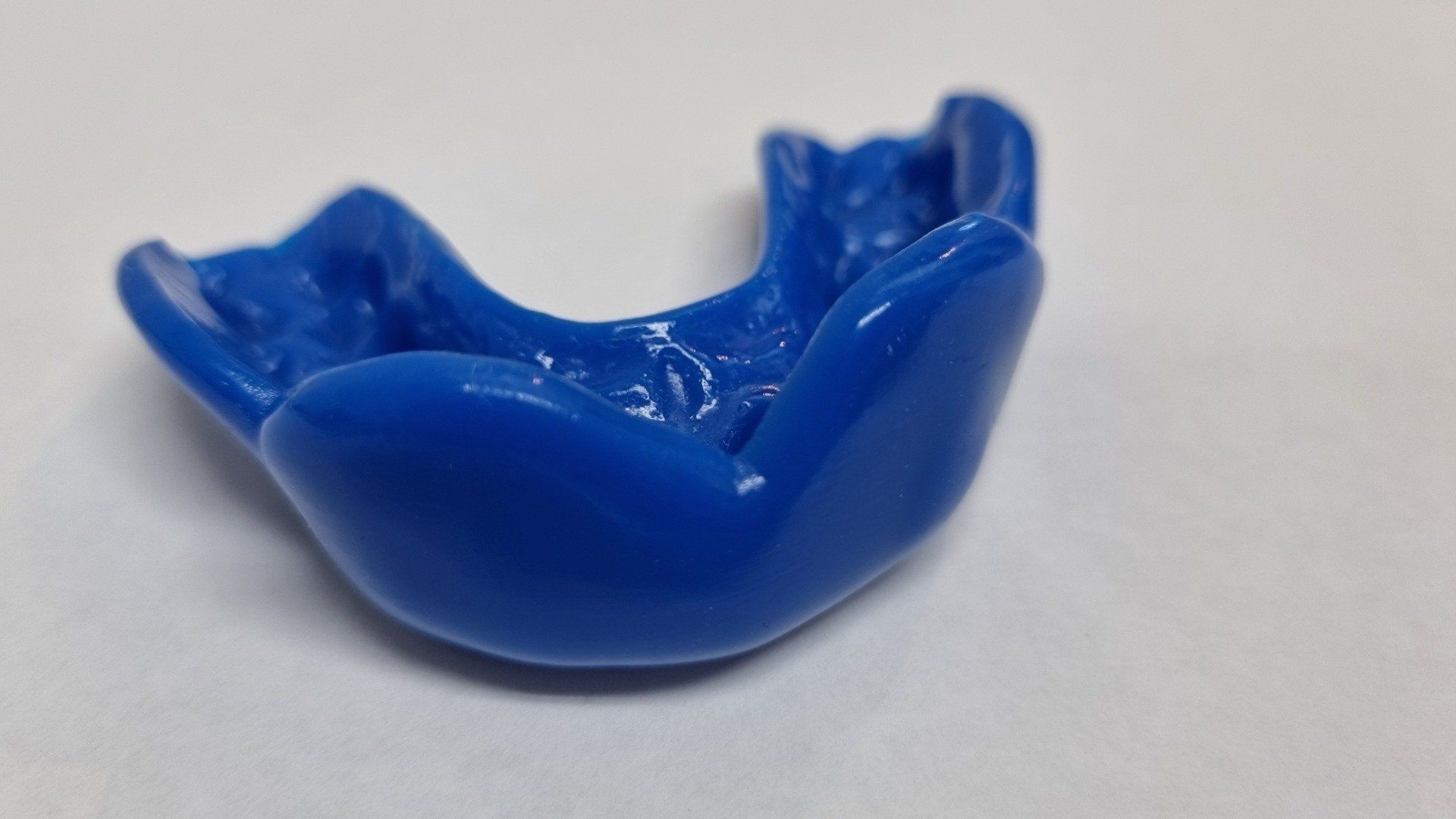 Dark Blue custom sports mouthguard by The Denture Care Group