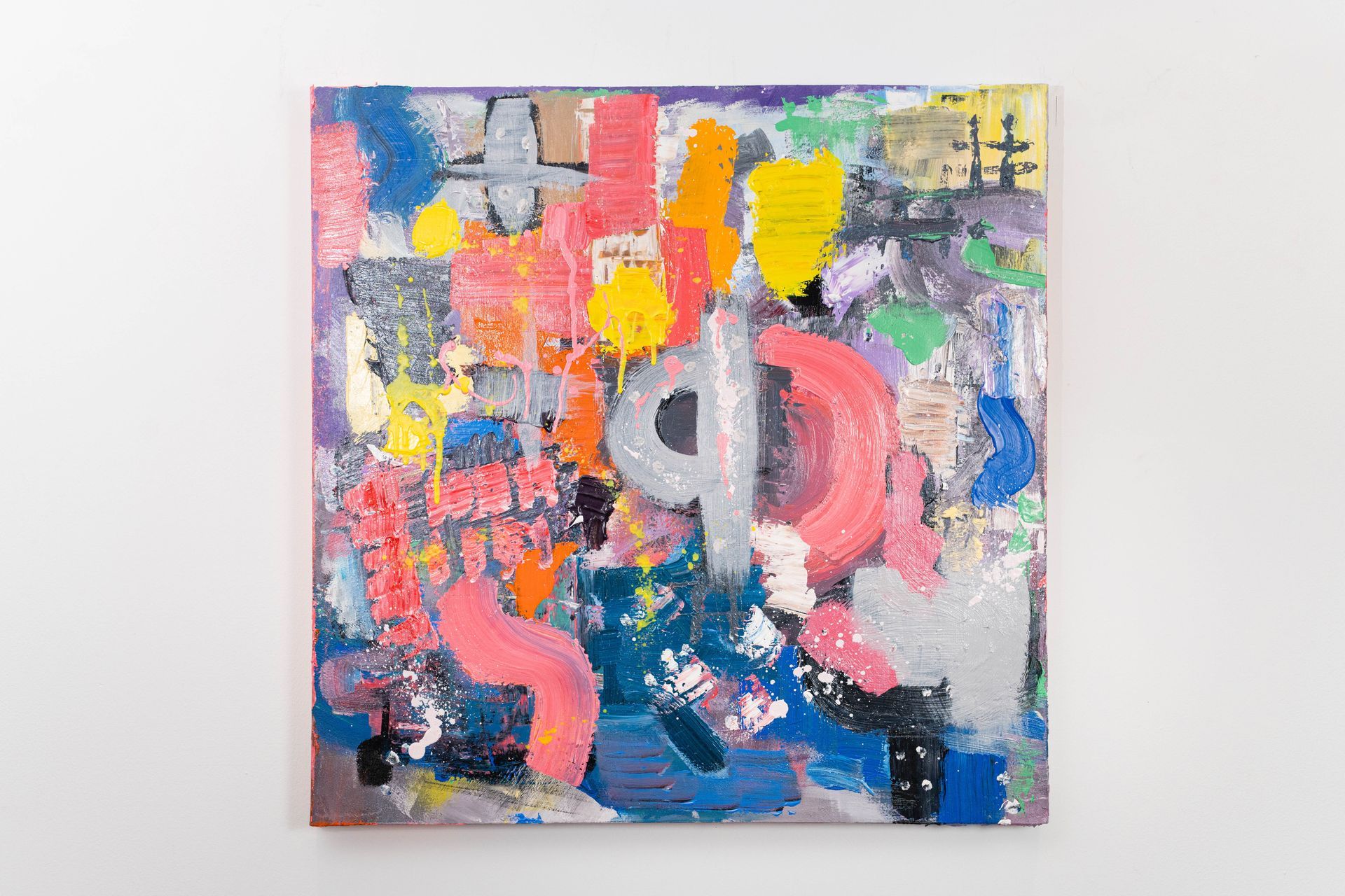 A colorful painting is hanging on a white wall.