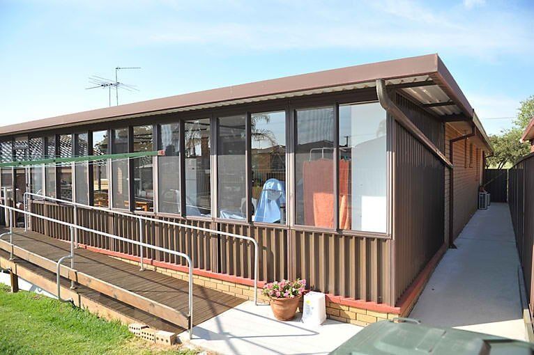 Wooden Ramp at the Side of the House with Handrail — Home Modification Services In Byron Bay, NSW