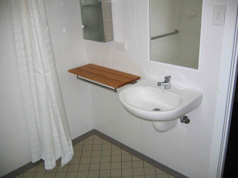 Lavatory with Curtain — Home Modification Services In Byron Bay, NSW