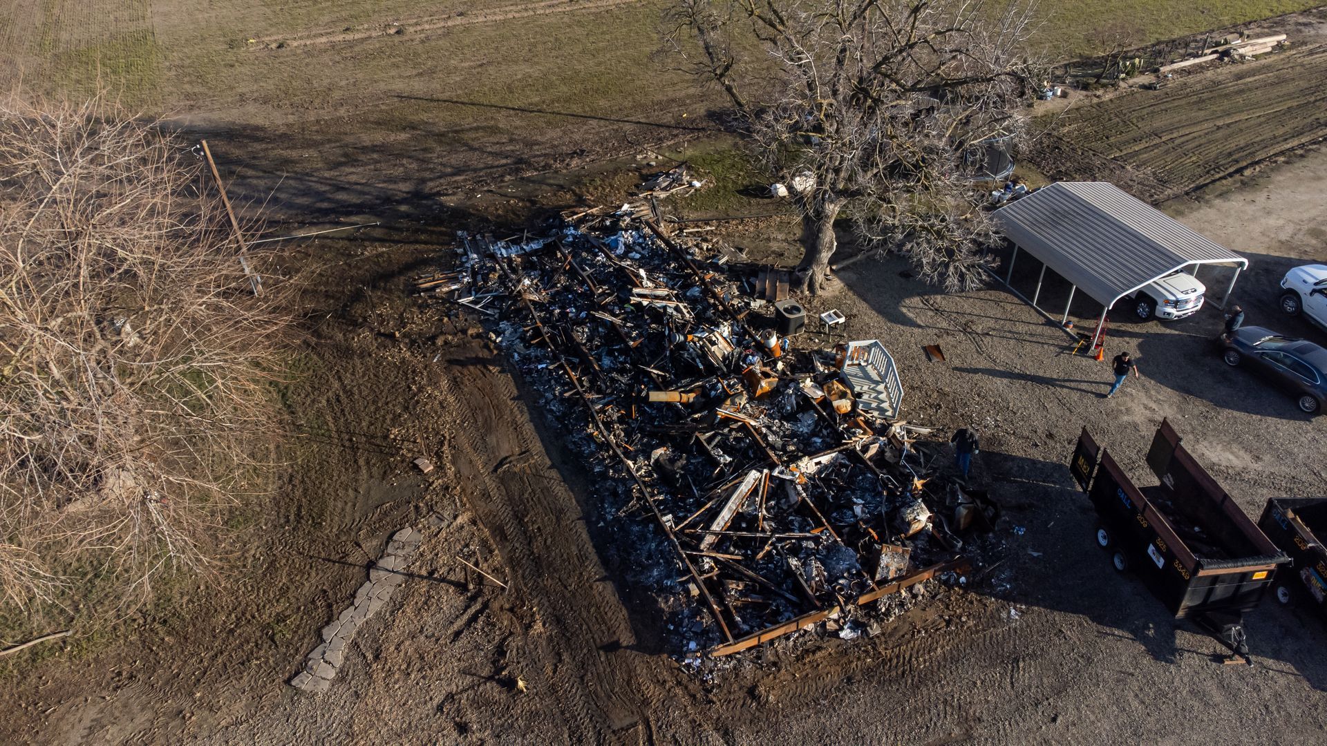 aerial photo of a burnt down home out in the middle of rural Merced, CA