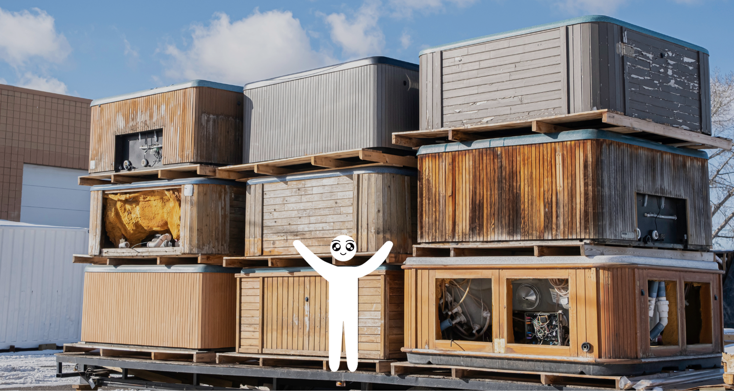 Stack of nine old hot tubs arranged in columns of three with a white stick figure man standing in fr