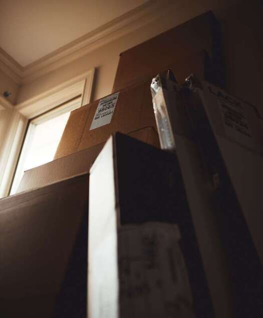 Assorted sizes of brown moving boxes