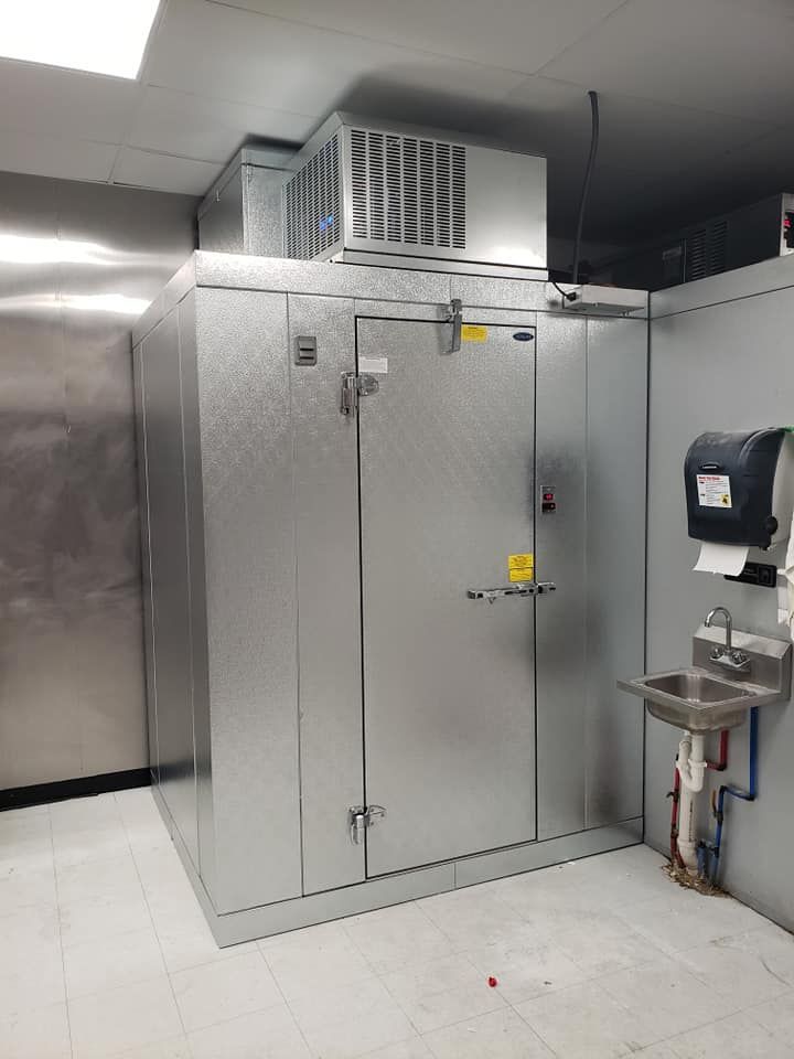 There is a sink in the middle of the room.