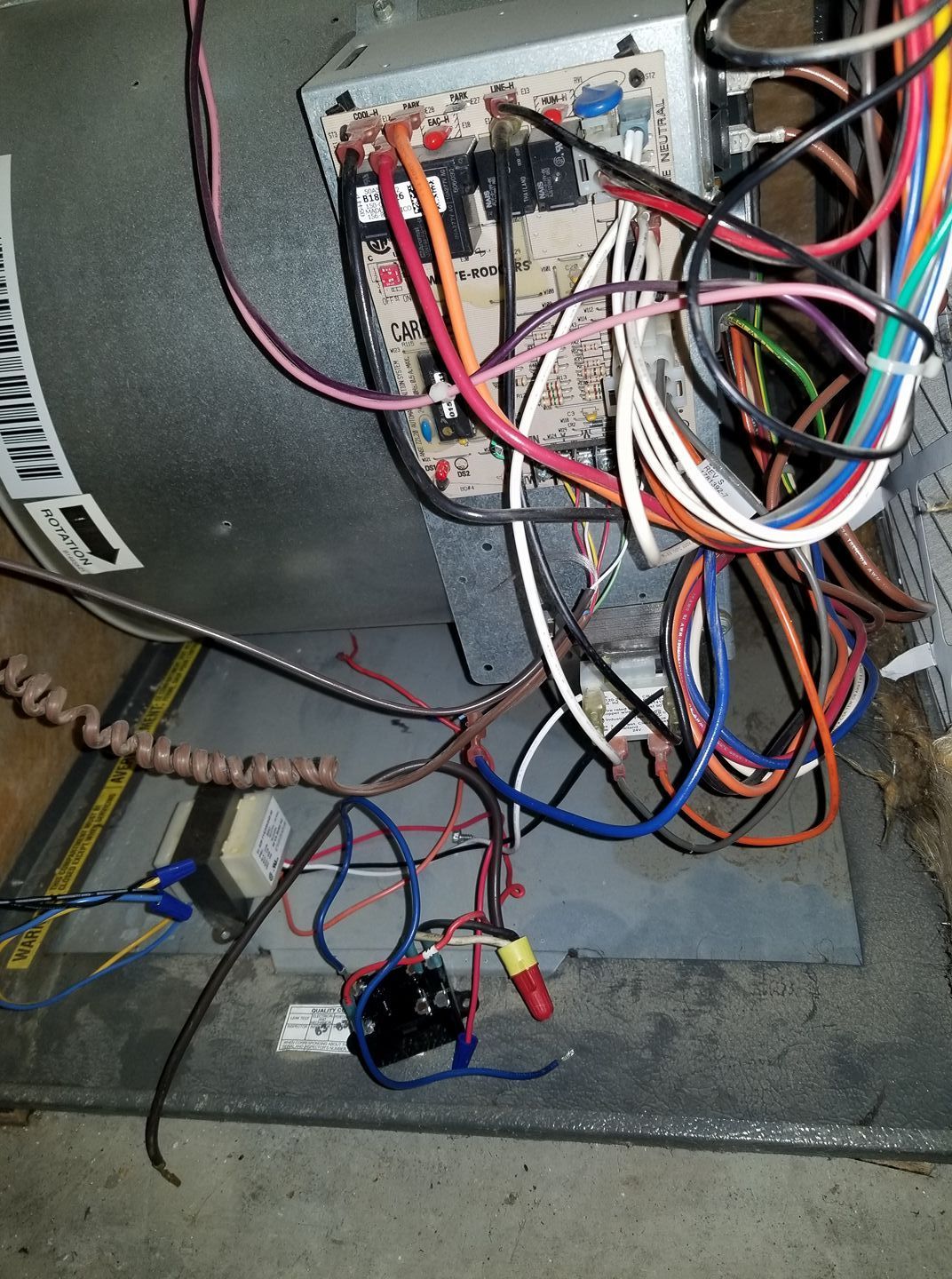 A bunch of wires are connected to a machine.