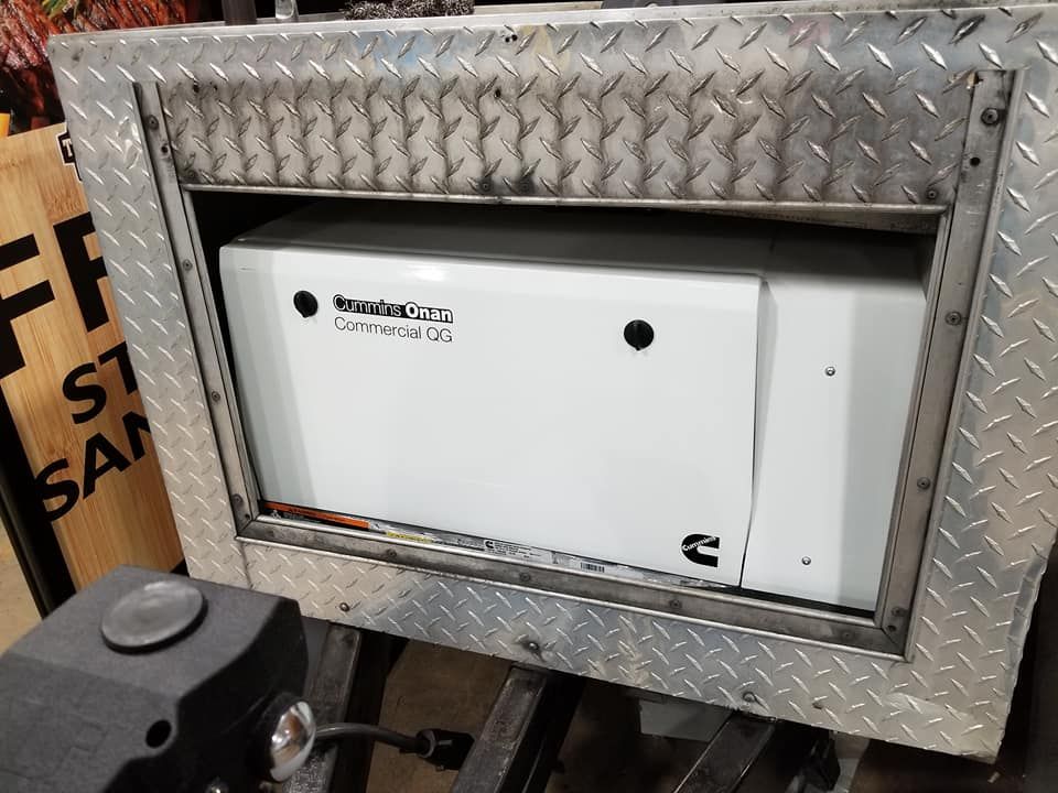 A stainless steel box with a white box inside of it