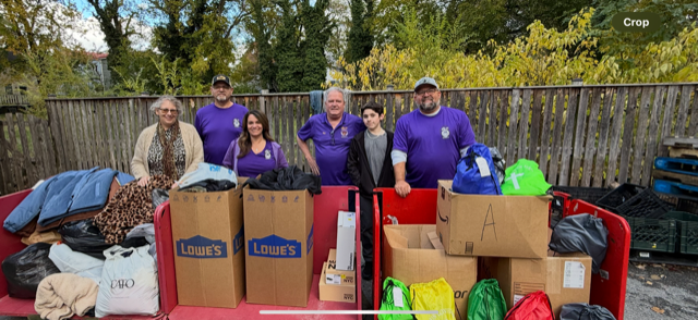 Winchester Elks 867 Lodge donated coats, hats, shoes and gloves to Andrea Cousens with CCAP