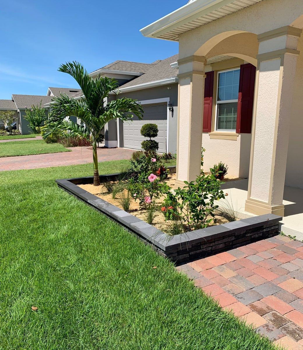 A house with a garden in front of it
