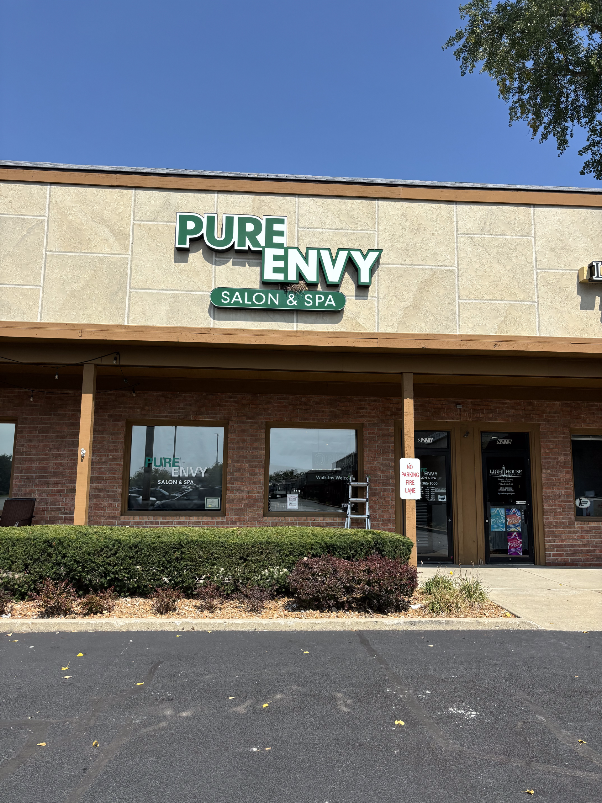 A building with a sign that says pure envy