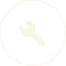 White circle with a light green wrench icon.