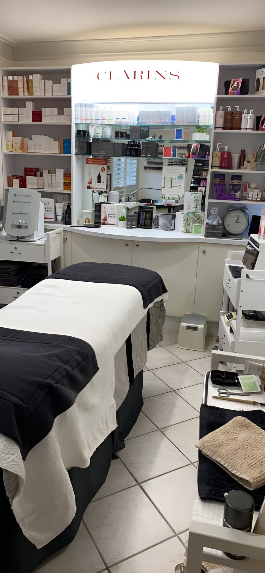 A Beauty Salon Interior with A Clarins Display — Beauty In Profile In Salamander Bay, NSW