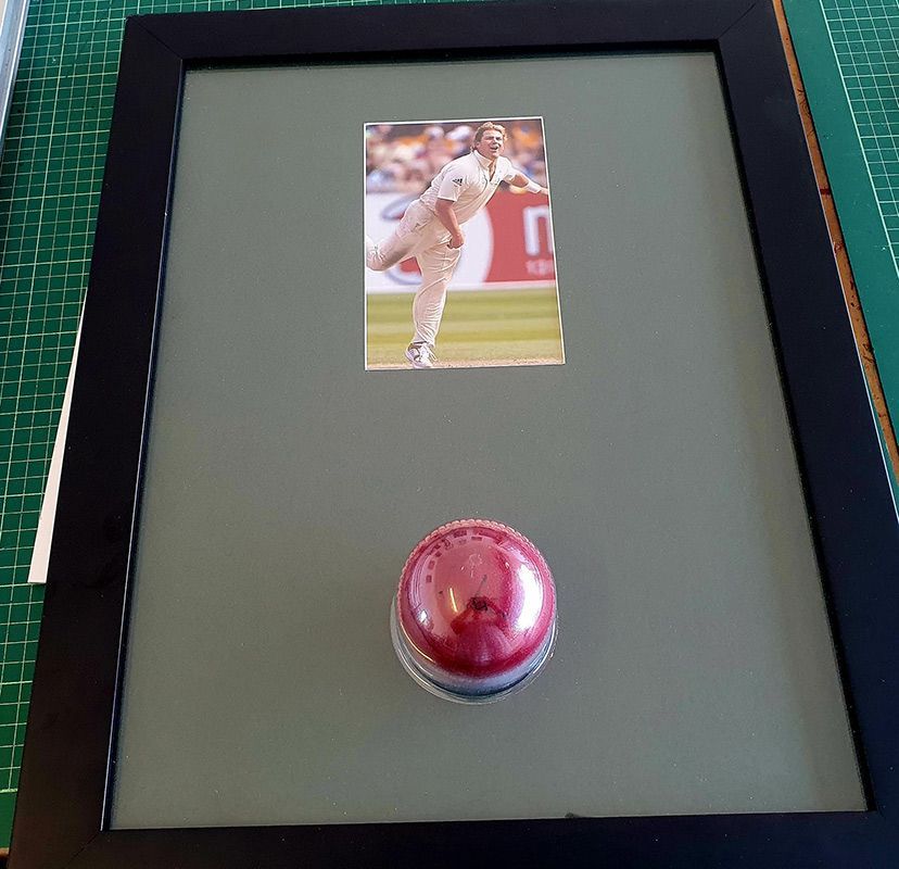 Framed picture of Shane Warne and autographed cricket ball — Picture Framing in Lammermoor, QLD