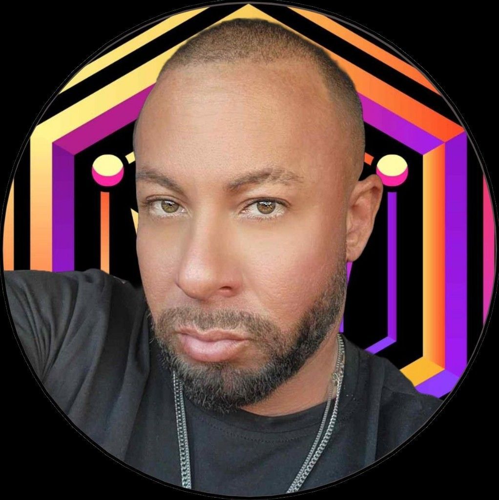 A man with a beard- Owner of King Me Digital, is taking a selfie in a circle.