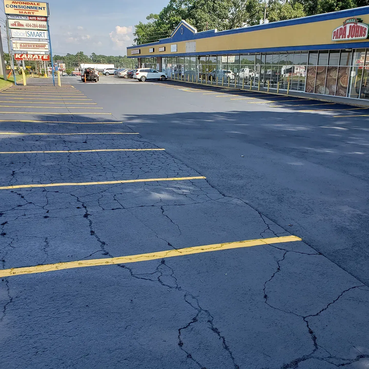 seal coated parking lot with new striping