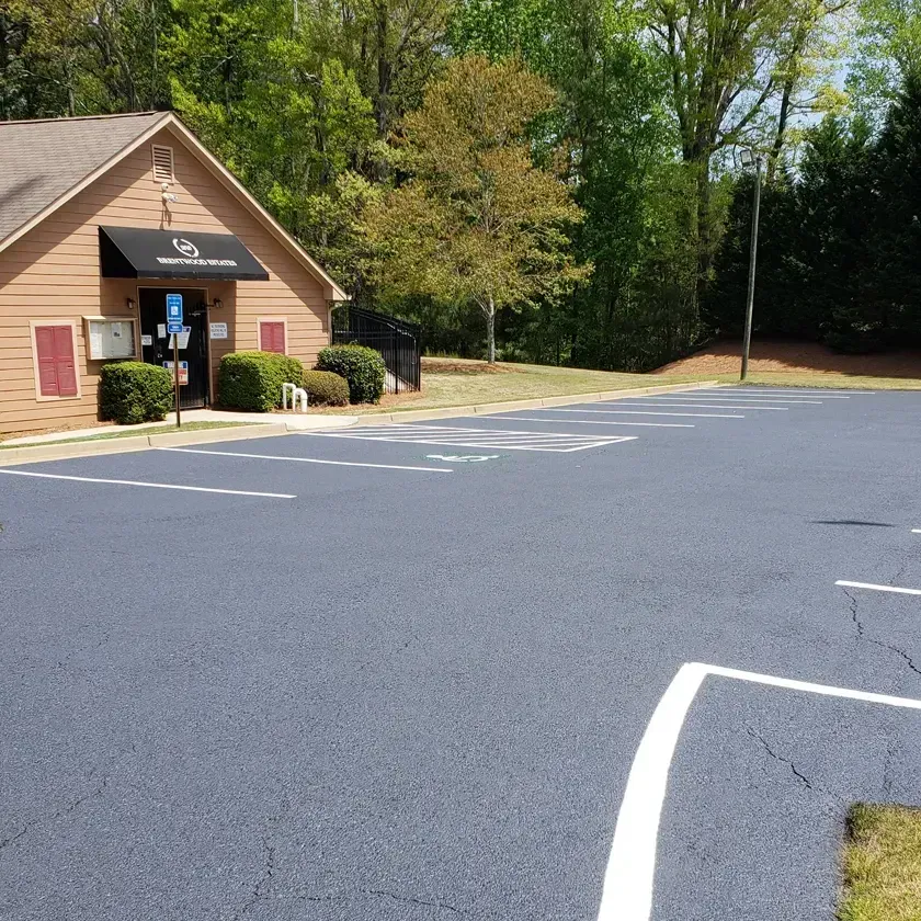 newly paved parking lot with striping