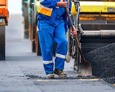 Workers and the asphalting machines — Plainfield, IL — Power Paving